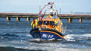 Invergordon Lifeboat RNLI 13-37 arriving at her new permanent home Invergordon Lifeboat RNLI 13-37 arriving at her new permanent home