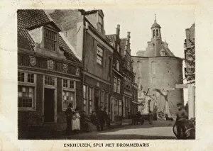 Street scene with Drommedaris, Enkhuizen, Netherlands Street scene with Drommedaris, Enkhuizen, Netherlands