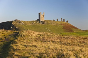 Dunstanburgh Castle - view from coastal path north of castle looking south - autumn Dunstanburgh Castle - view from coastal path north of castle looking south - autumn