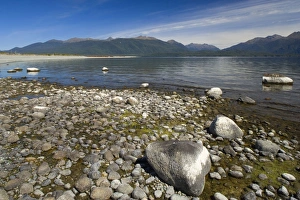 Lake Te Anau - shores of beautiful and calm lake Te Anau surrounded by mountains Lake Te Anau - shores of beautiful and calm lake Te Anau surrounded by mountains