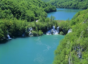 Plitvice Lakes - lower canyon with waterfalls and turqoise coloured lakes seen from above Plitvice Lakes - lower canyon with waterfalls and turqoise coloured lakes seen from above