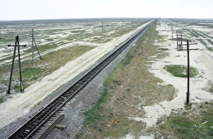 Railway Ashgabad - Krasnovodsk - in desert landscape along the Kopet-Dag mountains Railway Ashgabad - Krasnovodsk - in desert landscape along the Kopet-Dag mountains