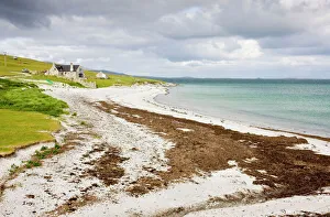 Sandy beach and croft on Berneray (Bearnaraigh), with the Sound of Harris beyond Sandy beach and croft on Berneray (Bearnaraigh), with the Sound of Harris beyond