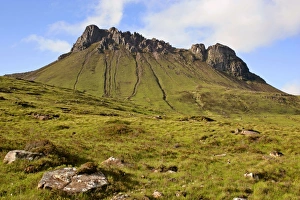 Stac Pollaidh - view from foot of mountain with sandstone turrets on its summit visible Stac Pollaidh - view from foot of mountain with sandstone turrets on its summit visible