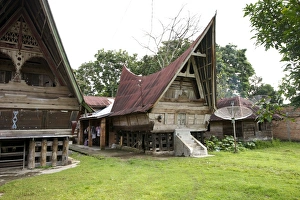 Batak Toba tribal rural village houses on Samosir Island in Lake Toba, Sumatra, Indonesia Batak Toba tribal rural village houses on Samosir Island in Lake Toba, Sumatra, Indonesia