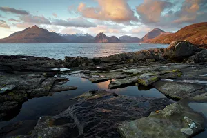 A beautiful November evening at Elgol on the Isle of Skye looking across Loch Scavaig towards the Cuillin Mountains, Scotland, United A beautiful November evening at Elgol on the Isle of Skye looking across Loch Scavaig towards the Cuillin Mountains, Scotland, United