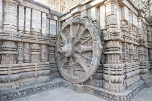 Carved chariot wheel on the wall of the 13th century Konarak Sun temple, built as the chariot of Surya the Sun god, UNESCO World Heritage Site, Konarak, Orissa, India, Asia Carved chariot wheel on the wall of the 13th century Konarak Sun temple, built as the chariot of Surya the Sun god, UNESCO World Heritage Site, Konarak, Orissa, India, Asia