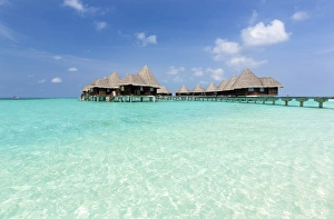 Clear sea, blue sky and over-water villas, Coco Palm Resort, Dhuni Kolhu, Baa Atoll Clear sea, blue sky and over-water villas, Coco Palm Resort, Dhuni Kolhu, Baa Atoll
