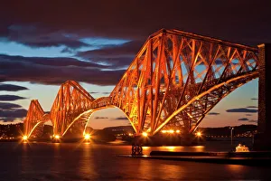 Forth Rail Bridge over the River Forth illuminated at night, South Queensferry, Edinburgh, Midlothian, Scotland Forth Rail Bridge over the River Forth illuminated at night, South Queensferry, Edinburgh, Midlothian, Scotland