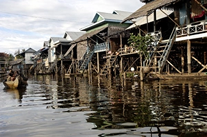 Kampong Phluk, a cluster of three villages of stilt houses on the floodplain of the Tonle Kampong Phluk, a cluster of three villages of stilt houses on the floodplain of the Tonle