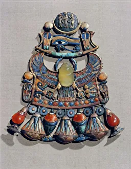 Pectoral in gold cloisonne with semi-precious stones and glass-paste, with winged scarab Pectoral in gold cloisonne with semi-precious stones and glass-paste, with winged scarab