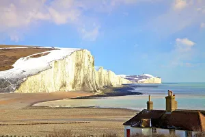 Snow on The Seven Sisters and Coastguard Cottages, Seaford Head, South Downs National Park Snow on The Seven Sisters and Coastguard Cottages, Seaford Head, South Downs National Park