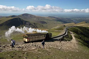 Snowdon Mountain Railway train and the Llanberis path, Snowdon, Snowdonia National Park Snowdon Mountain Railway train and the Llanberis path, Snowdon, Snowdonia National Park