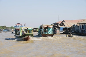 Tourist boats, Tonle Sap Lake, near Siem Reap, Cambodia, Indochina, Southeast Asia, Asia Tourist boats, Tonle Sap Lake, near Siem Reap, Cambodia, Indochina, Southeast Asia, Asia