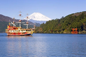 Tourist pleasure boat on lake Ashino-ko with the red Tourist pleasure boat on lake Ashino-ko with the red