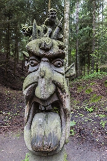 Wood carvings from traditional folklore at The Hill of Witches on the Dano River at the northern tip of the Curonian Spit, Klaipedia, Lithuania, Europe Wood carvings from traditional folklore at The Hill of Witches on the Dano River at the northern tip of the Curonian Spit, Klaipedia, Lithuania, Europe
