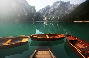 The iconic Braies lake (Pragser Wildsee) during a summer morning in the Dolomites, Italy The iconic Braies lake (Pragser Wildsee) during a summer morning in the Dolomites, Italy