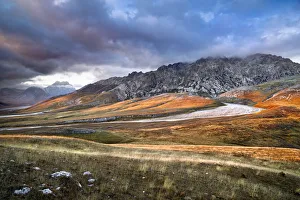Italy, Abruzzo, The grasslands of Campo Imperatore colored in acid yellow are the Italy, Abruzzo, The grasslands of Campo Imperatore colored in acid yellow are the