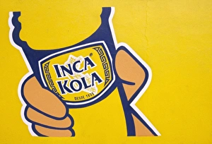 A painted sign for Inca Kola A painted sign for Inca Kola