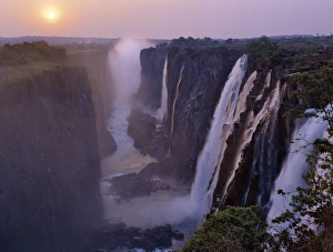 Sunset over the magnificent Victoria Falls Sunset over the magnificent Victoria Falls