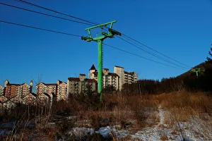 Empty buildings are seen at the abandoned Alps Ski Resort located near the demilitarized Empty buildings are seen at the abandoned Alps Ski Resort located near the demilitarized