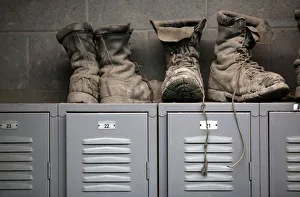 Coal mining boots are shown above miners' lockers before the start of an afternoon shift Coal mining boots are shown above miners' lockers before the start of an afternoon shift