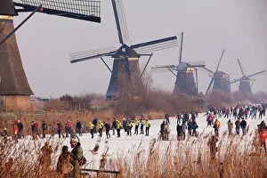 Ice Skaters and Windmills in the Netherlands Ice Skaters and Windmills in the Netherlands