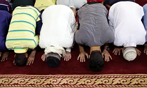 Sunni Muslims perform Eid al-Fitr prayers marking the end of the holy fasting month of Sunni Muslims perform Eid al-Fitr prayers marking the end of the holy fasting month of