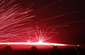 Tracer bullets ricochet off their targets as Japanese Ground Self-Defence Force tanks Tracer bullets ricochet off their targets as Japanese Ground Self-Defence Force tanks