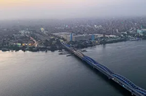 A view of the steel bridge known as Imbaba Bridge over the Nile River and the surrounding A view of the steel bridge known as Imbaba Bridge over the Nile River and the surrounding