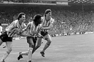 Coventry City's Dave Bennett (c) celebrates with teammates Keith Houchen (l Coventry City's Dave Bennett (c) celebrates with teammates Keith Houchen (l