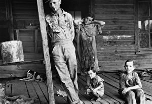 ALABAMA: FAMILY, 1936. Floyd Burroughs, a cotton sharecropper, and the Tingle children ALABAMA: FAMILY, 1936. Floyd Burroughs, a cotton sharecropper, and the Tingle children
