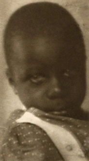 DAY: BOY, 1905. Portrait of a child at the Whittier School in Hampton, Virginia DAY: BOY, 1905. Portrait of a child at the Whittier School in Hampton, Virginia