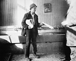 NEW YORK NEWSBOY, c1901. Newsboy in a Duane Street, New York, lodging house. Photograph NEW YORK NEWSBOY, c1901. Newsboy in a Duane Street, New York, lodging house. Photograph