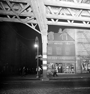 NYC: BOWERY, 1942. The Bowery at night in New York City. Photograph by Marjory Collins NYC: BOWERY, 1942. The Bowery at night in New York City. Photograph by Marjory Collins