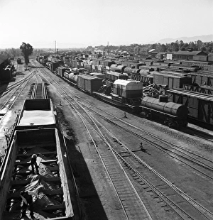 RAILROAD YARD, 1943. The Atchison, Topeka, and Santa Fe Railroad yard in Needles RAILROAD YARD, 1943. The Atchison, Topeka, and Santa Fe Railroad yard in Needles