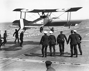 Squadron Commander Edwin Harris Dunning landing his Sopwith Pup biplane on the HMS ' Squadron Commander Edwin Harris Dunning landing his Sopwith Pup biplane on the HMS '