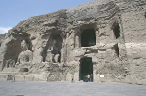 China, Shanxi, Datong, Yungang Grottoes, Rock-cut statues of Buddha in cave 19 and 20 China, Shanxi, Datong, Yungang Grottoes, Rock-cut statues of Buddha in cave 19 and 20