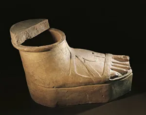 Italy, Calabria, Sarcophagus in the shape of a feet wearing a buskin, terracotta Italy, Calabria, Sarcophagus in the shape of a feet wearing a buskin, terracotta