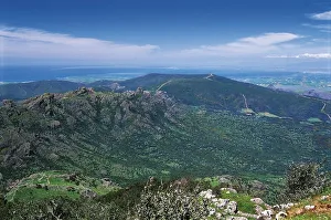 Italy, Sardinia Region, Costa Verde, Mount Arcuentu with Gulf of Oristano in background Italy, Sardinia Region, Costa Verde, Mount Arcuentu with Gulf of Oristano in background