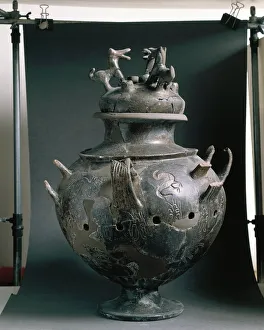 Picene calyx with a lid decorated with horses, Bucchero ware (black pottery) Picene calyx with a lid decorated with horses, Bucchero ware (black pottery)