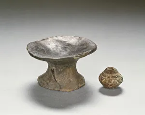 Plate and spindle whirl, from the necropolis of Le Rose of Tarquinia, province of Viterbo Plate and spindle whirl, from the necropolis of Le Rose of Tarquinia, province of Viterbo