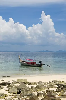 Thailand, Phi Phi Islands, Ko Phi Phi Don, Hat Ranti, longtail boat moored near beach Thailand, Phi Phi Islands, Ko Phi Phi Don, Hat Ranti, longtail boat moored near beach