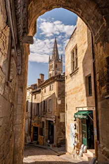 Bell tower under the arch, Saint-Emilion, France Bell tower under the arch, Saint-Emilion, France