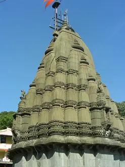 <b class=qtipBold><figcaption>Bhimashankar temple</figcaption></b><br>Bhimashankar temple is one amongst the twelve Jyotirlinga temples in India. A temple of Lord Shiva, the place is also where the Bhima river originates. Situated in the Sahyadri mountains, near Pune, it is a must visit place for the devotees of Shiva as well as a good picnic spot. Bhimashankar temple