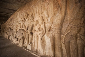 Carving details of Krishna lifting Govar-dhan Hill in order to protect the people of Carving details of Krishna lifting Govar-dhan Hill in order to protect the people of