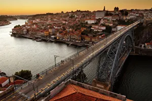 General view of Douro river and city of Oporto al sunset. Porto (Oporto), Portugal General view of Douro river and city of Oporto al sunset. Porto (Oporto), Portugal