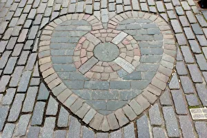 Heart of Midlothian, paving stones mosaic in front of St. Giles' Cathedral, High Street, Royal Mile, Edinburgh, Scotland, United Kingdom Heart of Midlothian, paving stones mosaic in front of St. Giles' Cathedral, High Street, Royal Mile, Edinburgh, Scotland, United Kingdom