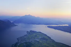 Lake Lucerne with the village of Weggis, in the distance, Pilatus Mountain, Lucerne Lake Lucerne with the village of Weggis, in the distance, Pilatus Mountain, Lucerne