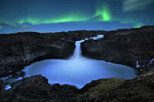 northern lights over Aldeyjarfoss waterfall in Iceland northern lights over Aldeyjarfoss waterfall in Iceland
